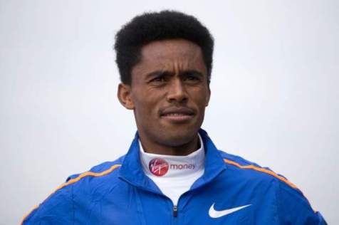 Ethiopia elite runner Feyisa Lilesa poses during a photocall for the men"s marathon elite athletes outside Tower Bridge in central London on April 20, 2017 ahead of the upcoming London Marathon
